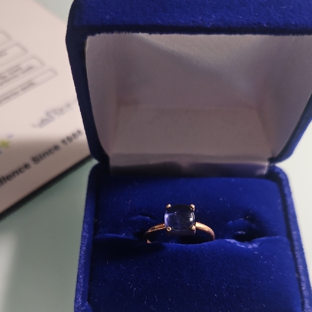 Elegant Gold Ring with Blue Stone